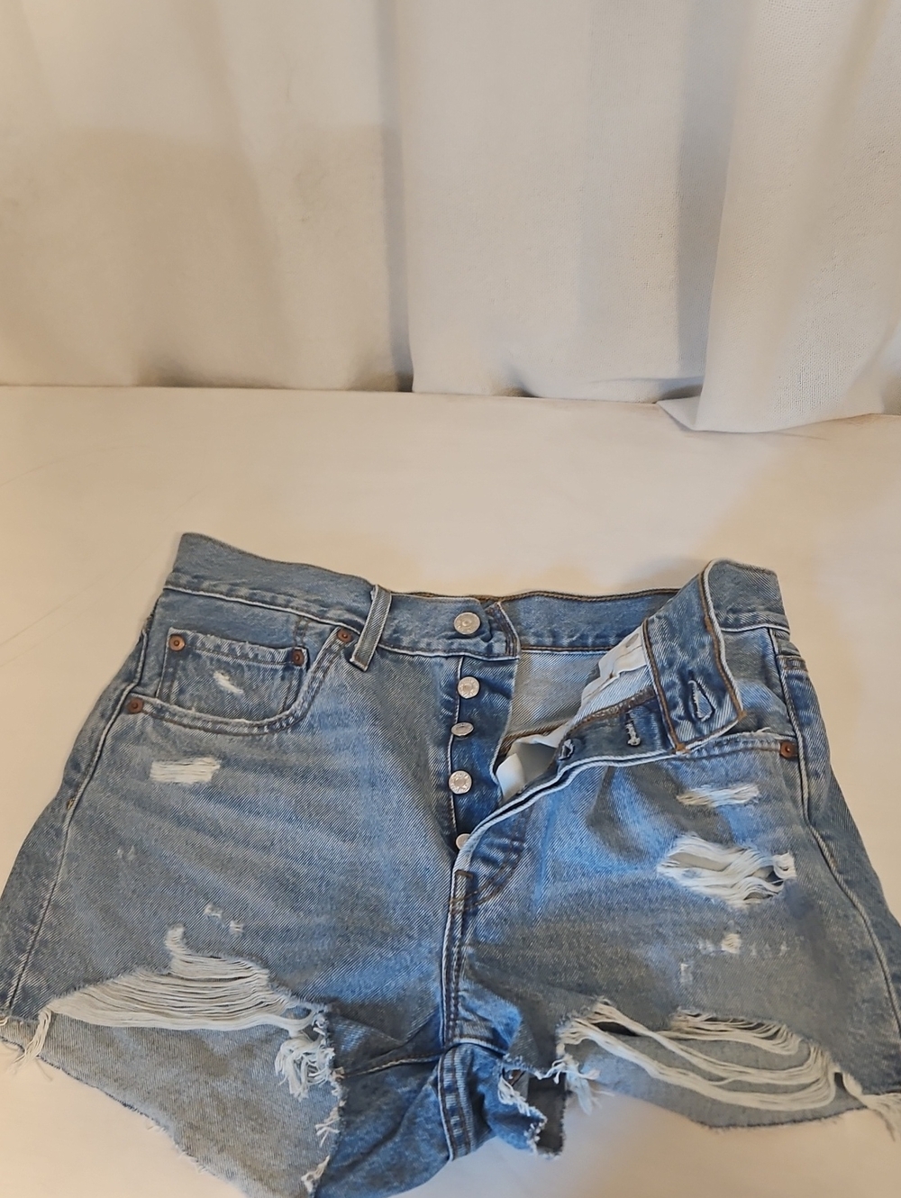 Levi's Light Wash Distressed Denim Cutoff Shorts